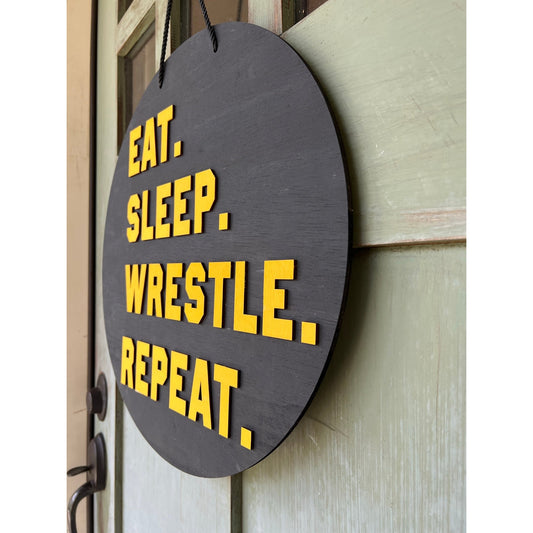 Eat Sleep Wrestle Repeat Door Hanger